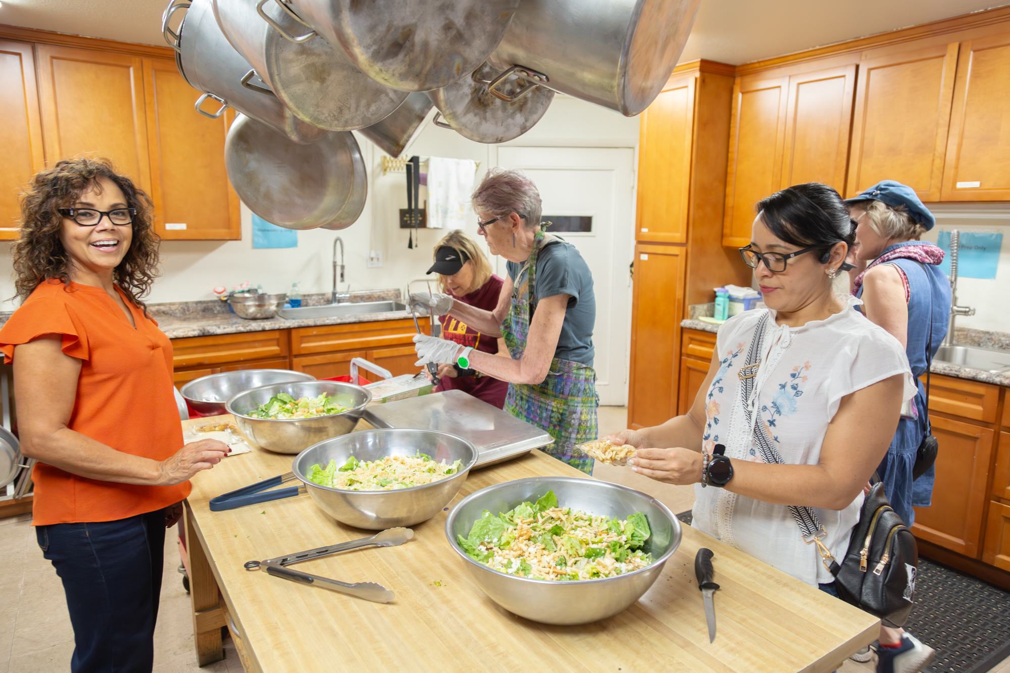 Gathering Inn volunteers preparing food